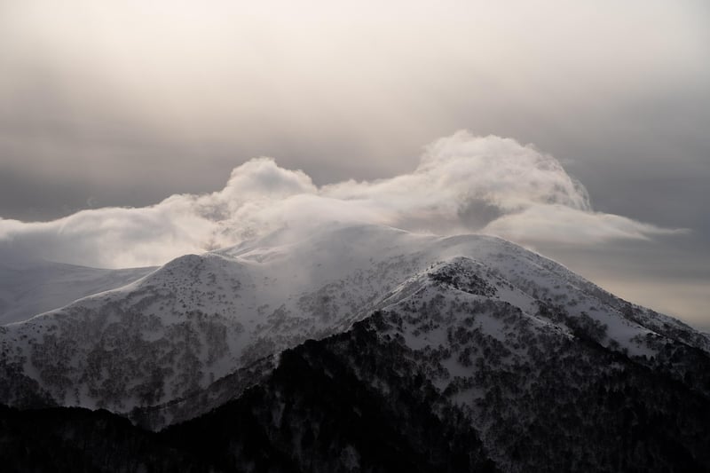 Scale towering peaks